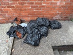 General waste, Bath, DIY Max £230 
cardboard, DIY. Bath, Toilet, bin bags of apples (approx 10 bags) 
3 piles, one at front, 2 at the back of the house. offer must be for all three piles as pictured. LN2 - removed for £240