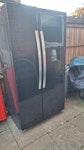 fridge freezer - broken Broken fridge freezer - easy and light to move. Outside in the garden and good drive and side access for collection SP5 - removed for £180