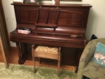 Removal of an upright piano. A heavy upright piano. LA7 - removed for £145