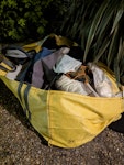 Bag of mixed rubbish A medium sized bag of mixed waste from a house tidy. Includes material, old baby and child items (not really reusable) and other items from our house. A tidy up so not junk from building works. SE21 - removed for £115