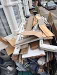 rubble bags luse rubish bathroom waist tiles plastic cladding plasterboard packeging glass shower tray mix of rubish flor boards 
rubish lokated in two places front garden and rear garden N17 - removed for £400