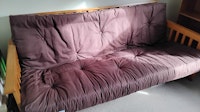 Futon with wooden base collected by JunkMove
