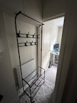 Coat Rack and Packaging 1x standing coat rack, 2 bags of packaging materials, broken down boxes SW6 - removed for £60