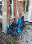 Rubble, architrave 8 x small bags of plaster
3 x bigger bags of wallpaper / general waste
Architrave
Shower screen (boxed)

Super easy access at front of property N17 - removed for £85