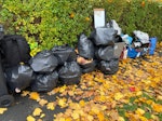 Emptied house rubbish Aprrox 15 bags with of junk, mixture of clothing, plastics and metals. 
Outside front of property. BS14 - removed for £100