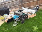 Household waste & old flooring push chair
old flooring waste 
Bags of mulch 
Boxes
Garden hose ME1 - removed for £185