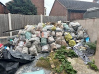Multiple bags of old render collected by Instant Rubbish Removals