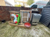 wooden crates, old boiler, toy collected by George Allens Waste