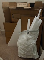 Broken furniture and boxes collected by Junk Freddy Ltd