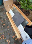 a few pieces of junk two window panes, bassinet, some wood and a pipe and a card box N21 - removed for £80