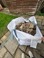 Two ton bags of red brick rubb collected by Long Gone Waste Diposal