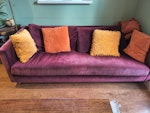 3 seater sofa Purple velvet three seater sofa. Some signs of wear and tear but clean and reusable. Dimensions: length 207 cm, depth 93cm. N8 - removed for £100