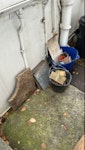 garden/house rubble Two buckets containing bricks and tiles, eight tiles, concrete slab N5 - removed for £50