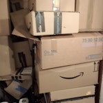 cardboard boxes & black sacks clear cardboard boxes from porch, and approx 10x black sacks from bedroom EN3 - removed for £100