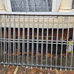 bagged & metal waste 2 old suitcases full of waste, 1 shovel, 5 metal chair frame parts, 1 black metal rod and bunk bed in pieces. NW2 - removed for £100