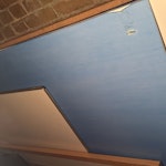 Furniture Removal. Remove backing boards from shop. E1 - removed for £110