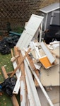stud wall, DIY/Garden waste in the front garden ready to collect 

x1 small door
Stud Wall - plaster board & timber
tiles 
Garden waste x4 bags
DIY waste x3 bags
Tiles & bathroom refurb odds and bits SE5 - removed for £195