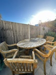 old garden furniture a wooden table and 6 sits as garden furniture sitting in back garden. there is straight route from garden to front door with no steps or hard manoeuvre. W4 - removed for £105