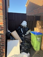 10 bags, wood, vinyl flooring collected by Ican Services