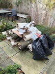 20 rolls of carpet, 4 bin bags 20 rolls of carpet that have been taken out the house and 4 bags of rubbish plus a bit of cardboard. Every that needs to be collected is visible in the photos. E8 - removed for £180