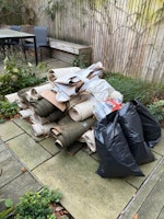 20 rolls of carpet, 4 bin bags collected by Advance Waste