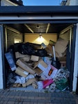 lots of junk lots of cardboard (majority boxes), some plastic bin bags, luggages etc. KT19 - removed for £165