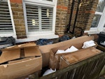 cardboard packaging trash bags mostly cardboard boxes and packaging with about 5 trash bags. very easy access from front garden W13 - removed for £80