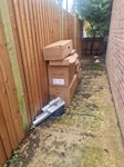 Packaging Packaging, cardboard, metal trains, wires. Waste is behind garage. RG4 - removed for £107