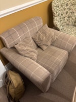 An armchair collected by Just Waste Removals Limited