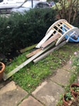 Door; wood; plast & mixed bits Victorian solid pine door; paddling pool; metal clothes airer; wooden posts from garden structure; bag of mixed rubbish ie plastic metal, and broken ceramic;deckchair NW6 - removed for £150