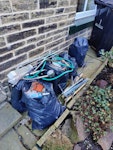 5 bags of rubble, door, tiles Waste from bathroom renovation - 5 bags of rubble, toilet, door, tile offcuts, small radiator, wood from door frame, old lino floor, metal plumbing pipes, bath side panel. Everything in the pictures except for the chairs and bins. HX7 - removed for £225
