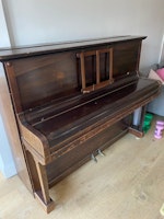 Upright piano collected by Waste Machine