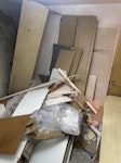 House rip out Mix of bedroom furniture with carpets and underlay in bedroom once top waste removed and then small fitted kitchen materials plus cardboard boxes and the new kitchen waste. Tiles in builders sack will need emptying as need sack back M26 - removed for £375