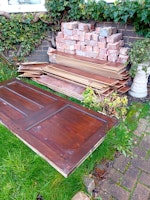 brick,laminate flooring,door. collected by Mersey Waste (NW) LTD