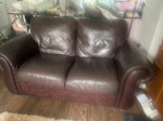 two leather sofas one sofa good condition, 2 seater re usable and dark brown leather
2nd sofa was good and very nice leather Now well used may be possible for use in a “den” or suchlike but probably for disposal 
happy for donation of one and to pay for the others disposal M22 - removed for £163