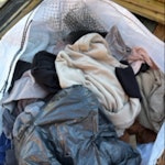 clothes - duvets etc Edit- not builder waste - clear out of clothes approx 7 hoodies - 8 shirts - few jeans - duvets ( the two king size duvets are the items taking up most of the bag) - bathroom wall cabinet - rug x 1 - hallway mat x 1 . The items can be taken away in the bag for ease. NUMBER 17 is down the side of 18. FIRST SET OF HOUSE WITH SOLAR PANELS ON YOUR LEFT RH17 - removed for £73