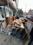 10 bags, bath, wood, units 10 bags - mainly tiles and general waste - old bath, old flooring, wood planks, kitchen units
NOT THE WALL UNIT - ONLY REMOVE ITEMS MENTIONED. SW17 - removed for £400