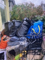 attic junk: mostly bags + wood collected by M&V waste Clearance