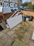 Mostly wood. Few bags of mixed Mostly timber, floorboards/doors.  Few bags as well E9 - removed for £143