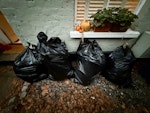 Four bags of garden waste Four black bags of leaves, sticks and other garden waste, including the remnants of a small rusted fire pit. Bags are in front of residence with easy access behind gate. W4 - removed for £57