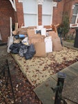 old kitchen units, cardboard building waste, mainly some old kitchen units that have been dismantled, old carpets, cardboard etc W13 - removed for £286
