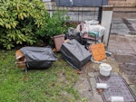 Mattress, chair, frames etc our neighbour died of old age at the hospital, and someone has piled all her  rubbish into our bin area. everything that doesn't fit in the bins needs to be collected NW6 - removed for £143