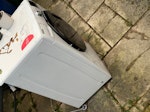 washing machine and other stuf some wood, a washing machine, carpet hoover and other junk M26 - removed for £81