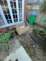 Boxes with rubbish collected by M&V waste Clearance