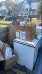wood, chairs, toilet, radiator cardboard boxes, a desk, toilet, small radiator, pieces of wood, 2 garden chairs, 1 pallet, polystyrene, mental hinges, plastic pool cover. BR1 - removed for £152