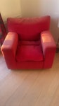 Red Arm chair Arm chair that has been used and is faded but still has use left in it and is comfy. BN1 - removed for £64