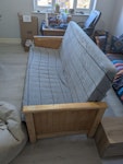 Sofá bed Sofá bed with wooden sidearms and metallic reclining frame and two pillows . I. Fairly good condition/resellable. It's a 3rd floor with no lift. You may find it easier to disassemble. There is parking N9 - removed for £129