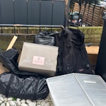 bed frames & slats, old junk bed frame & slats, old suitcases, bin bags old clothes, 1x white old storage box, cardboard box TW9 - removed for £86