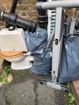 Old toilet, few bags of masony Old toilet , some associated building masonry/all bagged/old lights in the brown boxes /one old exercise stepper broken down. Note access  to the property for  pick up is at the back via Aliwal mews, junk is outside so can pick up anytime/easily SW11 - removed for £86