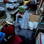 Mix of junk as per photos Mix of items including an ironing table, red chair, luggage, cardboard box, small furniture, ventilator, piece of wood, an old sink and a couple of bags. This excludes the trolley. SE15 - removed for £110